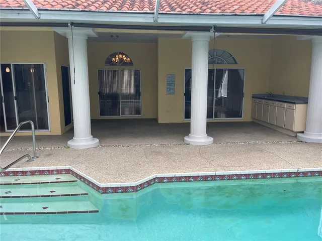 a view of backyard with green space