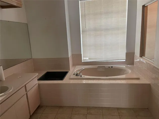 a bathroom with a bathtub