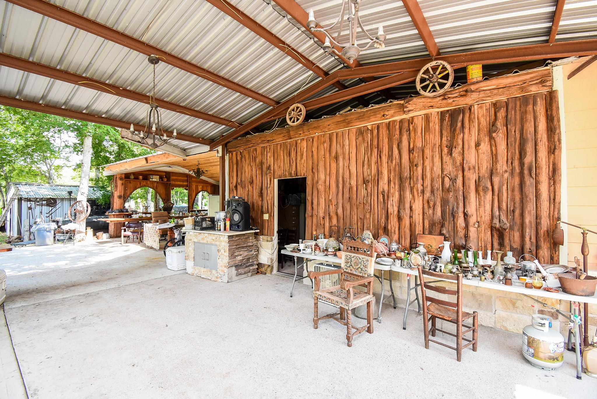 39551 Donigan Road Brookshire, TX 77423 - Photo 8 of 37 Garage featuring wooden walls and a shed