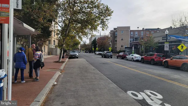 a view of a street with cars