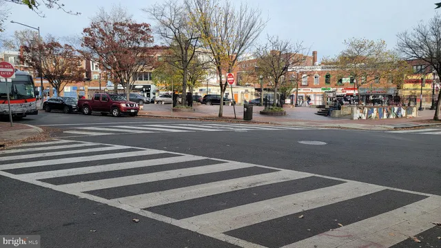 a view of a city street with a building