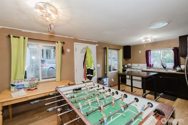 a room with furniture pool view and a window