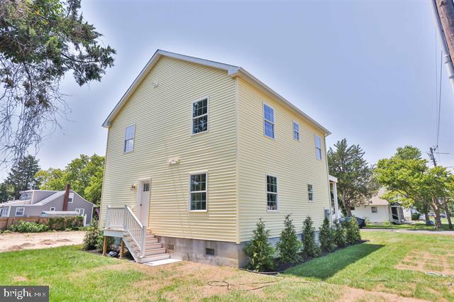 2 5th Street Del Haven, NJ 08251 - Photo 2 of 24 a view of a house with yard and plants