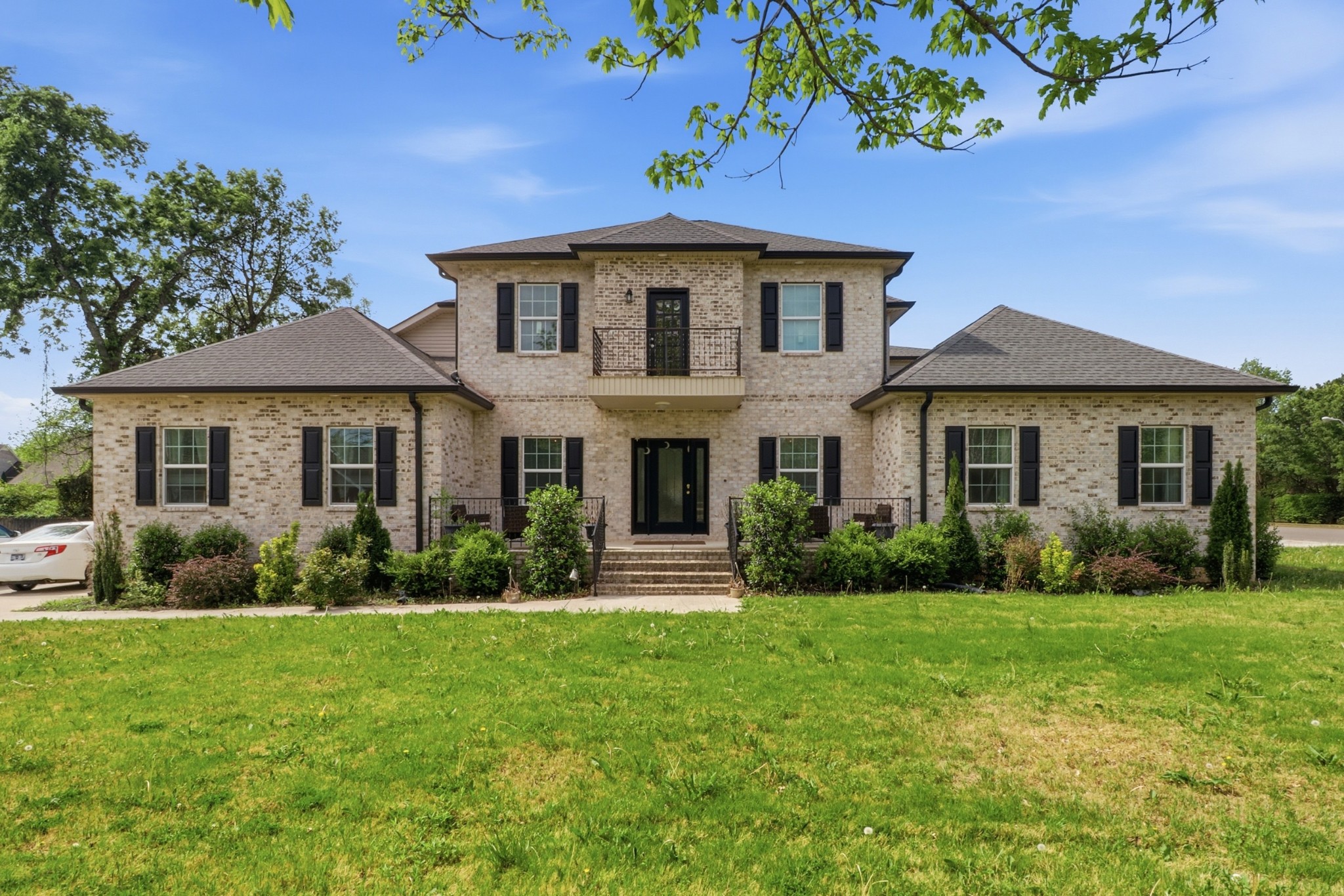 126 Savannah Ridge Murfreesboro, TN 37127 - Photo 1 of 50 a front view of a house with garden