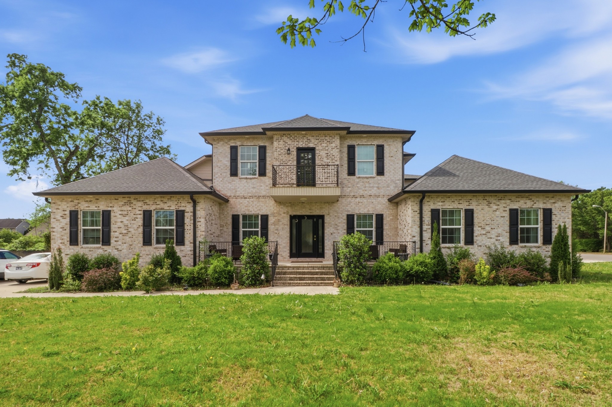 126 Savannah Ridge Murfreesboro, TN 37127 - Photo 2 of 50 a front view of a house with garden