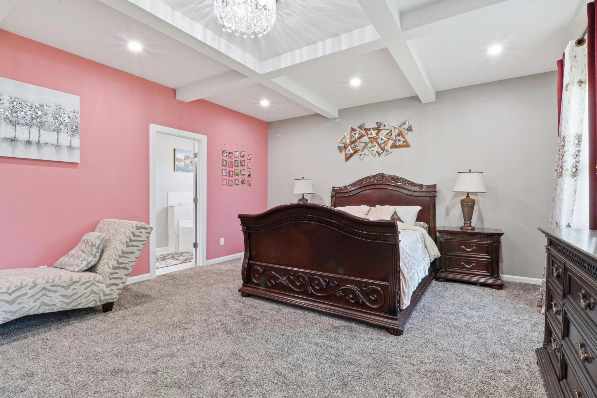 126 Savannah Ridge Murfreesboro, TN 37127 - Photo 21 of 50 a bedroom with a bed and a chandelier