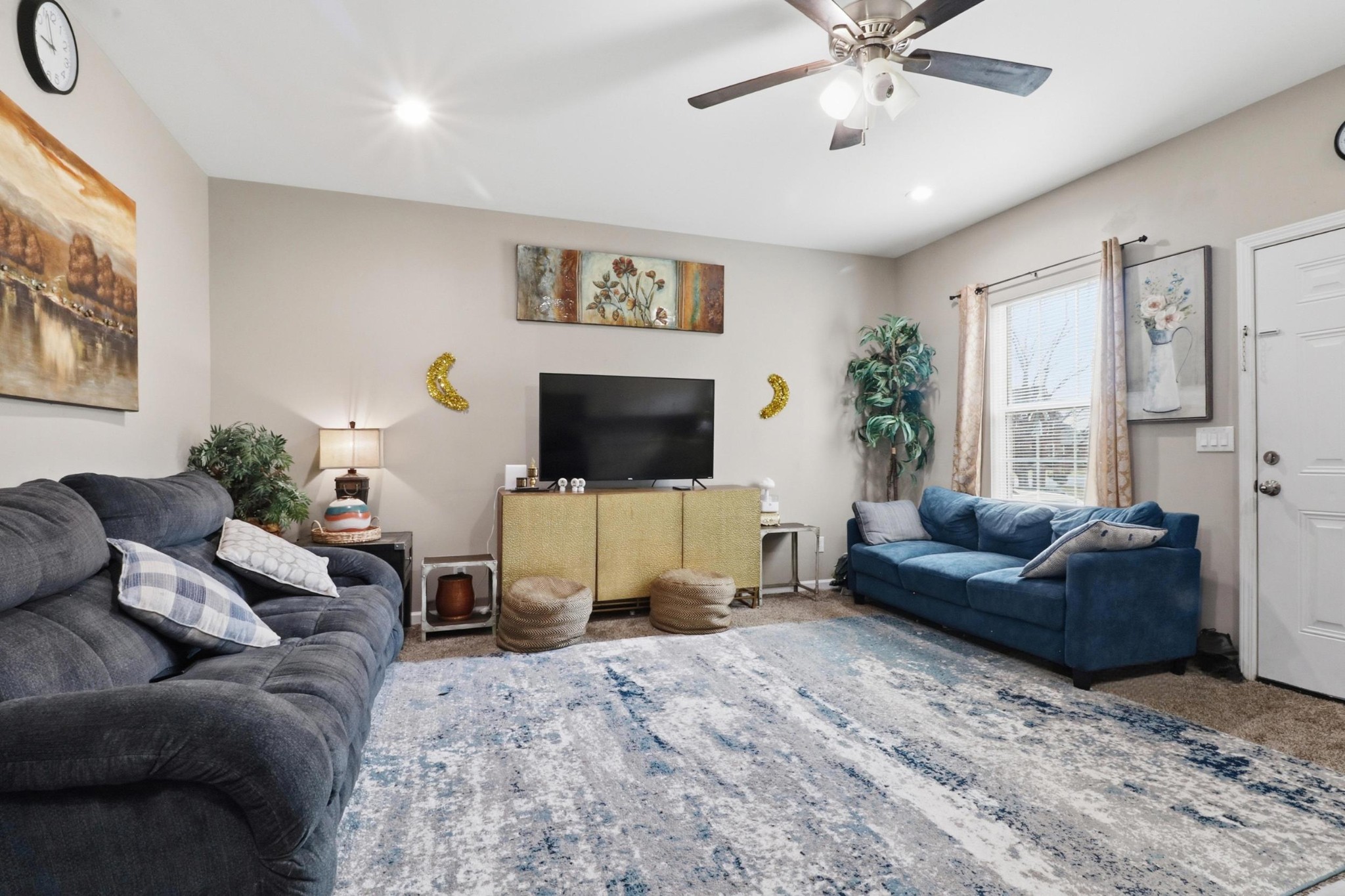 126 Savannah Ridge Murfreesboro, TN 37127 - Photo 24 of 50 a living room with furniture and a flat screen tv