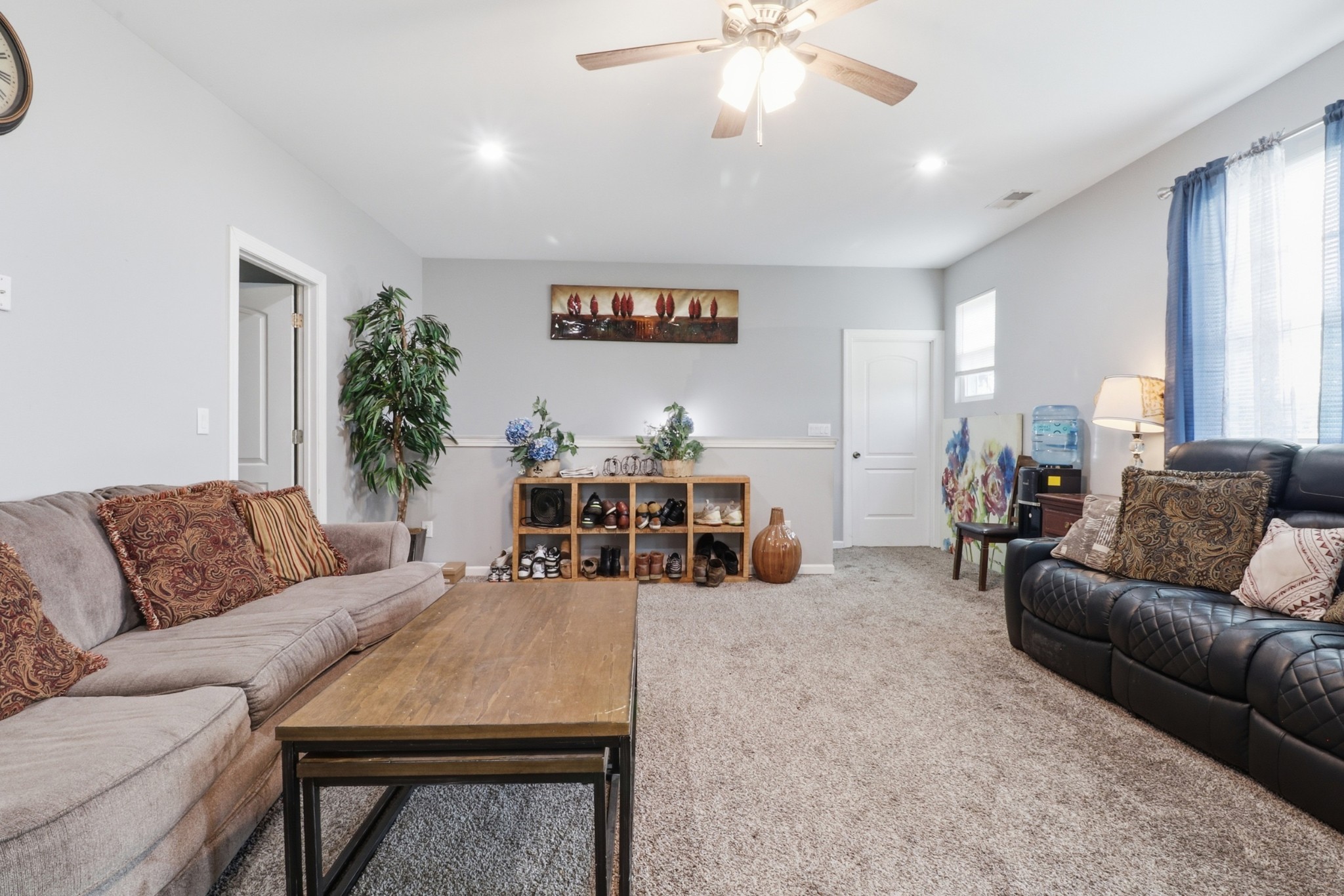 126 Savannah Ridge Murfreesboro, TN 37127 - Photo 30 of 50 a living room with furniture and a chandelier