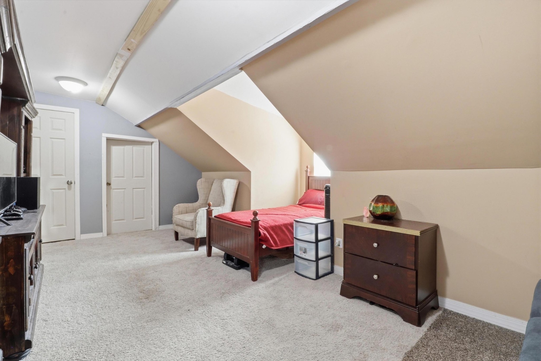 126 Savannah Ridge Murfreesboro, TN 37127 - Photo 34 of 50 a spacious bedroom with a bed and a flat screen tv