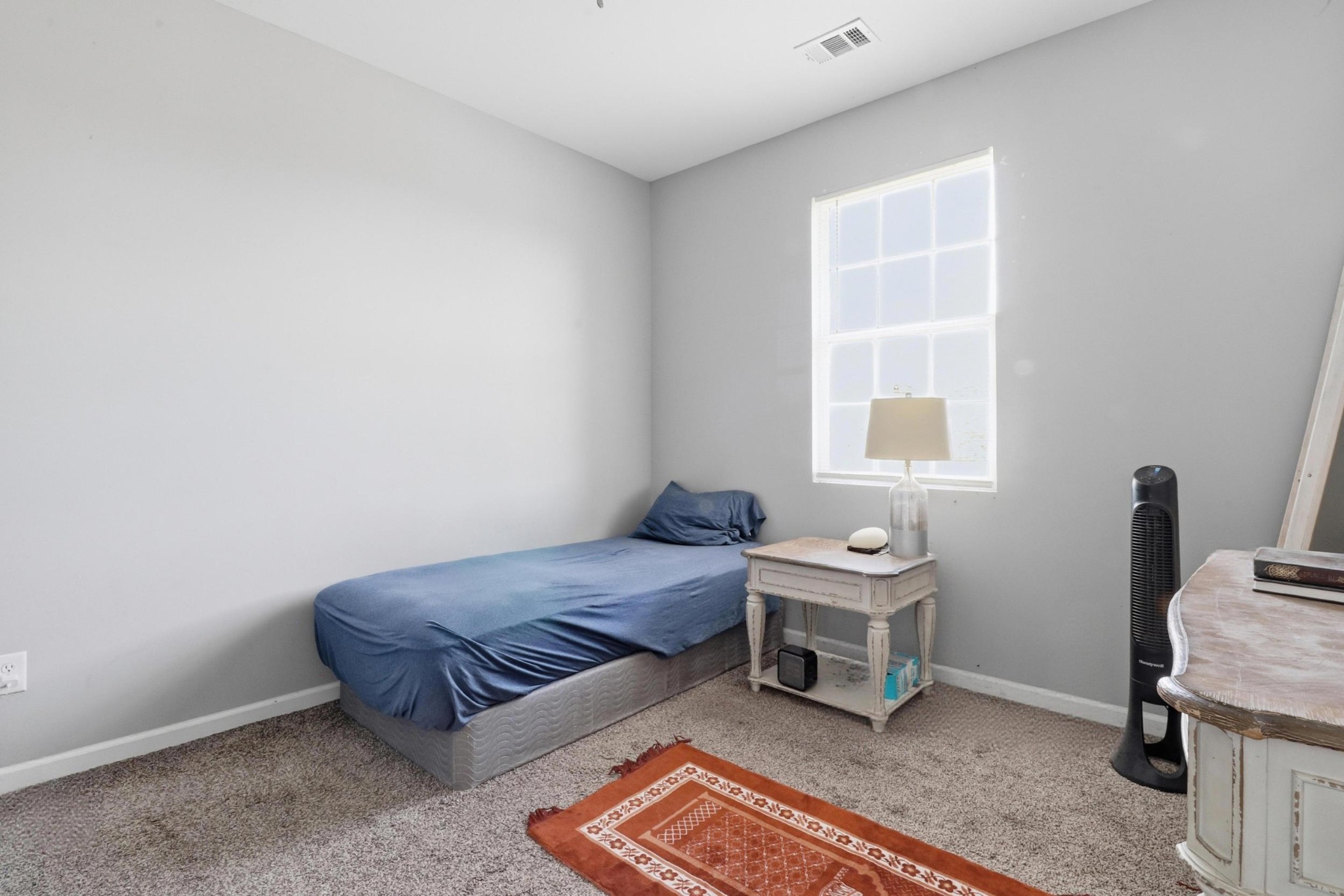 126 Savannah Ridge Murfreesboro, TN 37127 - Photo 36 of 50 a bedroom with a bed and a window