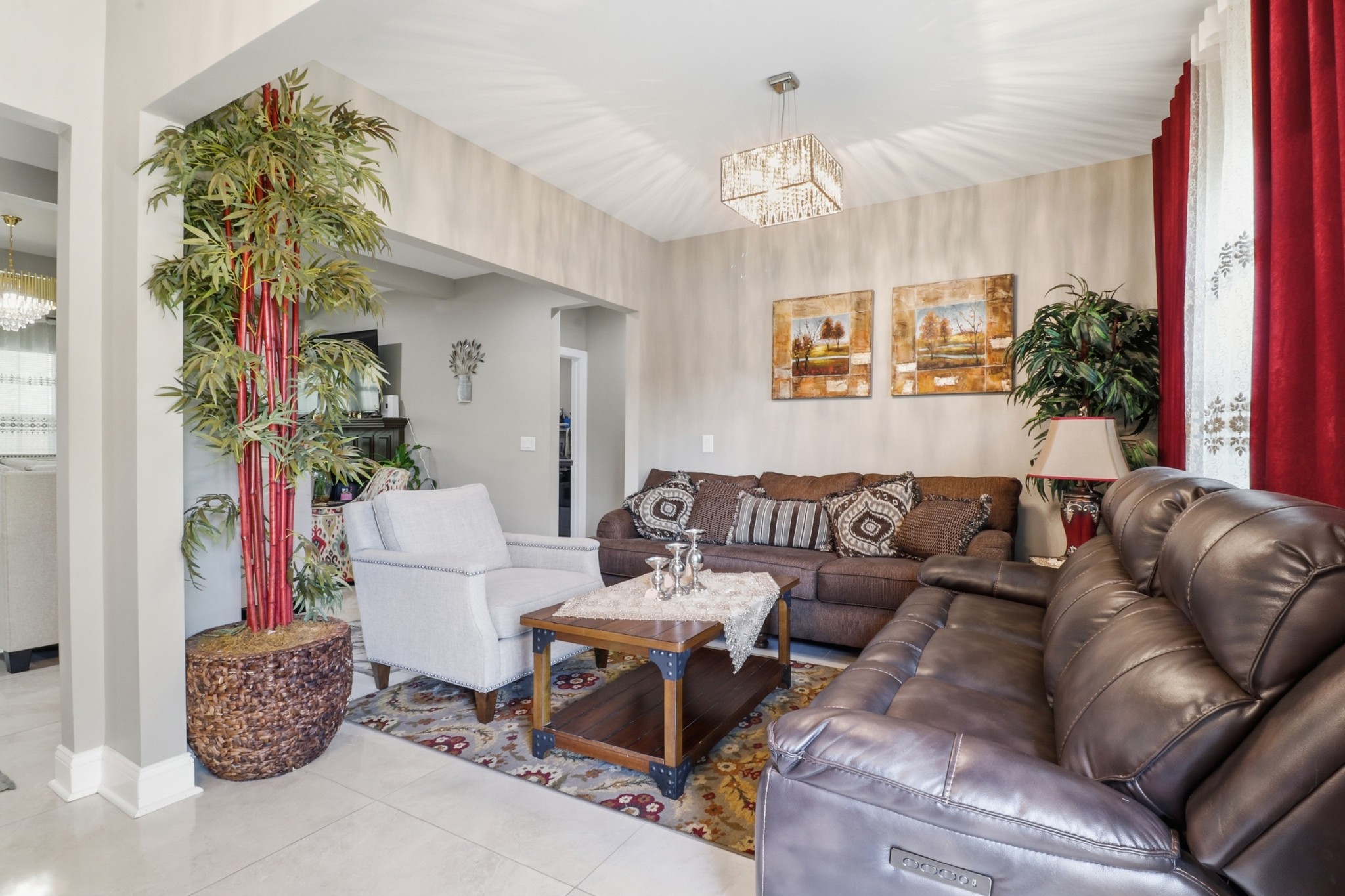 126 Savannah Ridge Murfreesboro, TN 37127 - Photo 5 of 50 a living room with furniture and a chandelier