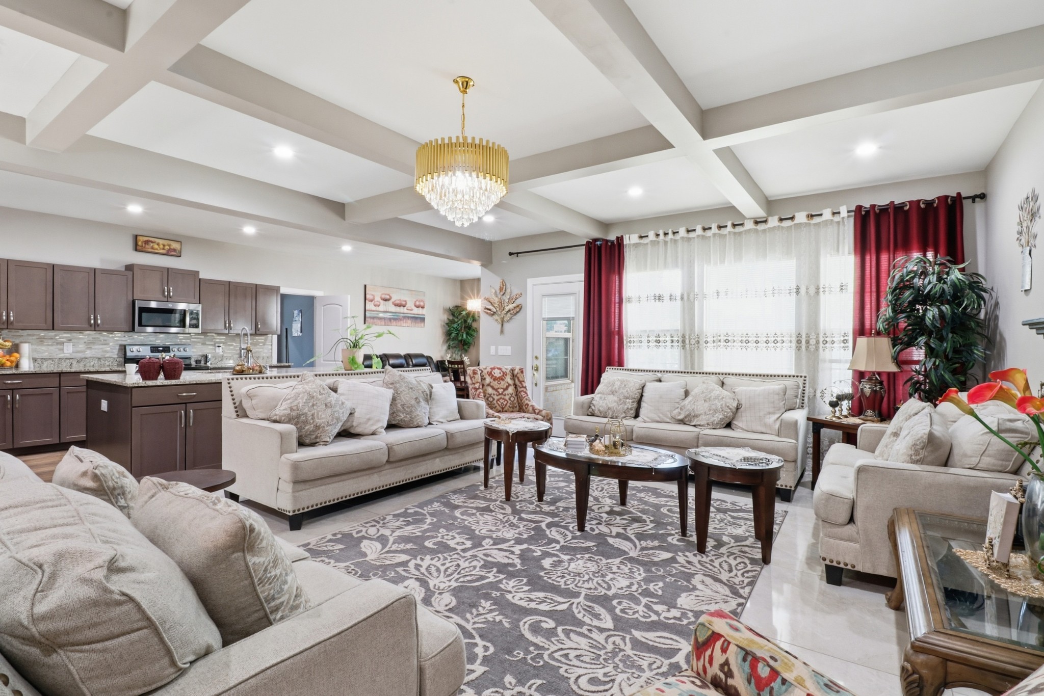 126 Savannah Ridge Murfreesboro, TN 37127 - Photo 9 of 50 a living room with furniture kitchen view and a chandelier