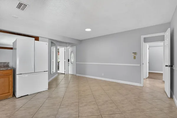 a view of a hallway with door space