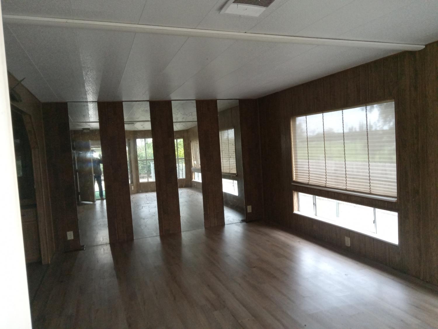 602 South Spruce Road Exeter, CA 93221 - Photo 22 of 28 a view of gallery with wooden floor