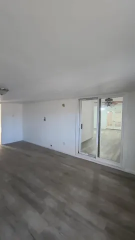 a room with a dresser and a mirror