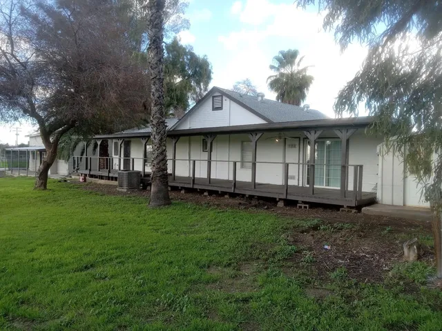 a view of a house with a garden