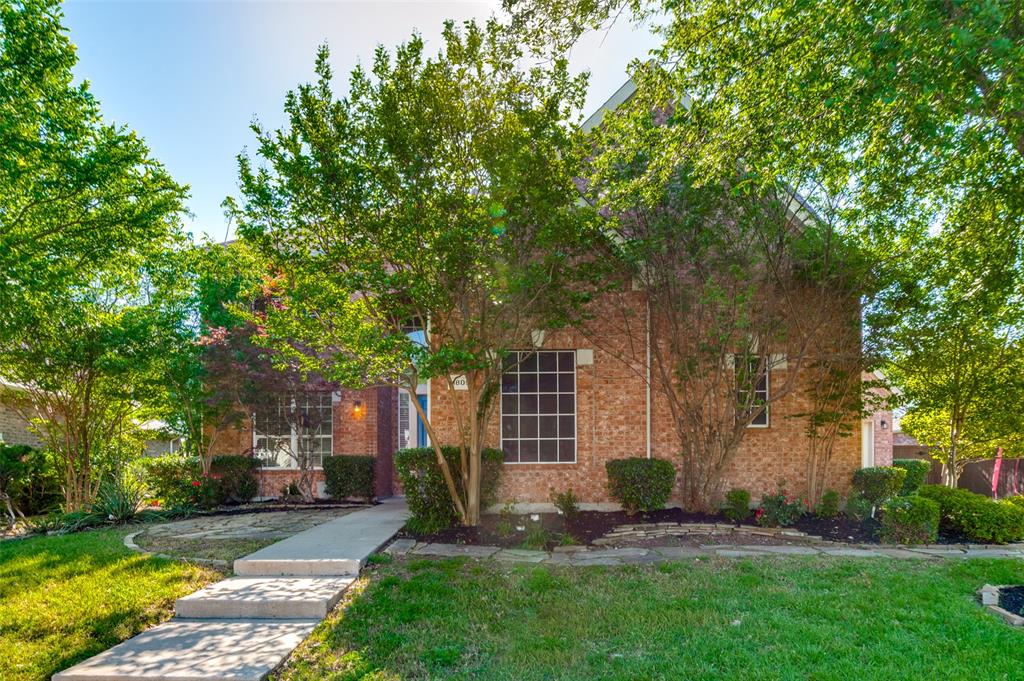 1805 Canyon Creek Drive McKinney, TX 75072 - Photo 1 of 39 front view of a house with a yard