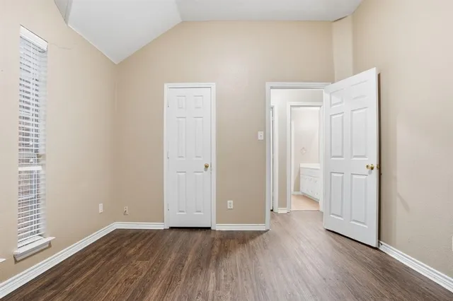 a view of a livingroom with wooden floor
