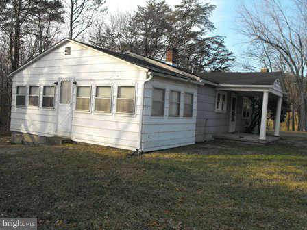 116 Paw Paw Road North Bloomery, WV 26817 - Photo 14 of 16 a view of house with backyard
