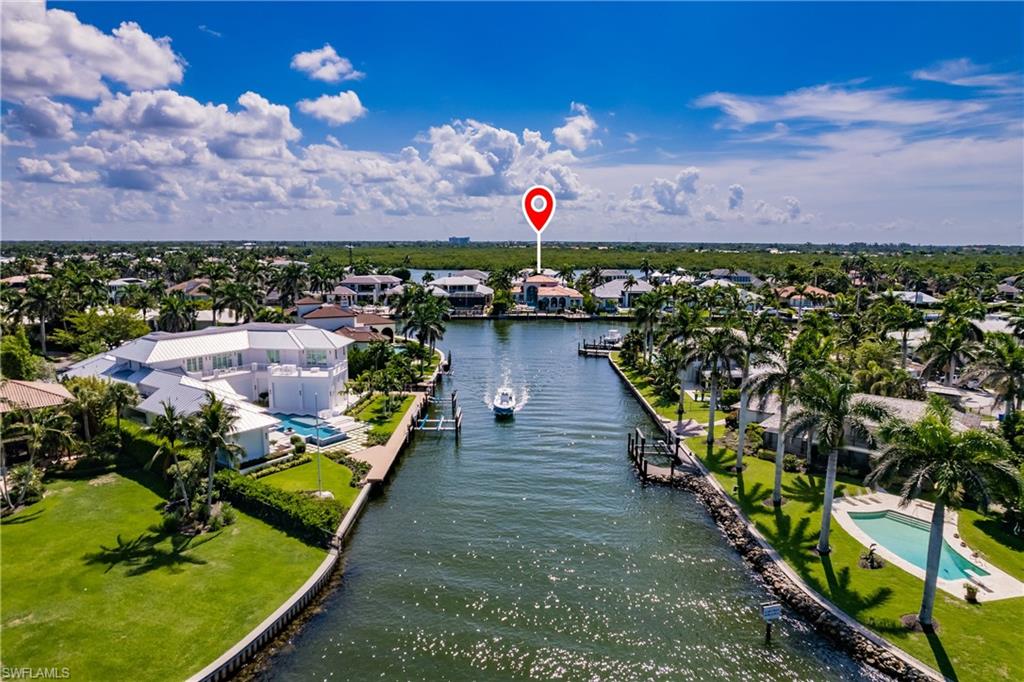 a view of a balcony with wooden floor