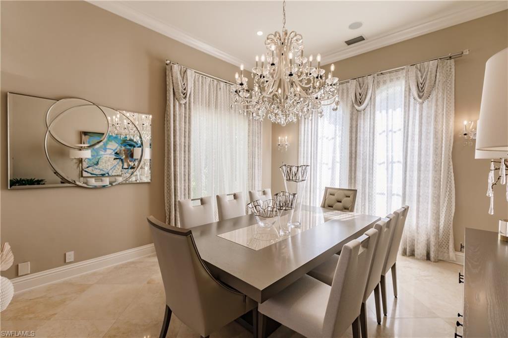 2450 Tarpon Road Naples, FL 34102 - Photo 19 of 26 a view of a dining room with furniture window and outside view