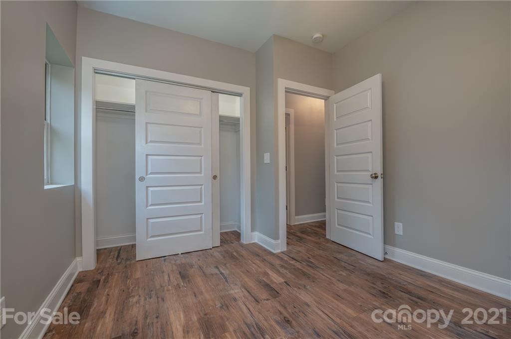 196 Caledonia Road Landrum, SC 29356 - Photo 18 of 26 wooden floor and closet in a room