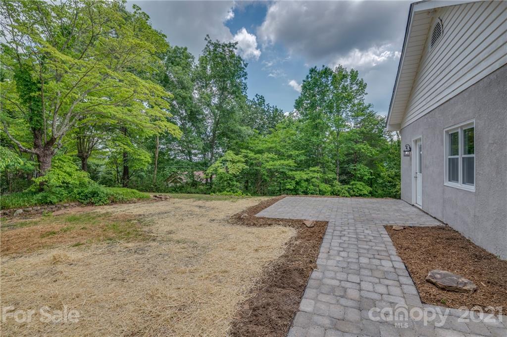 196 Caledonia Road Landrum, SC 29356 - Photo 22 of 26 a view of an outdoor space and a yard