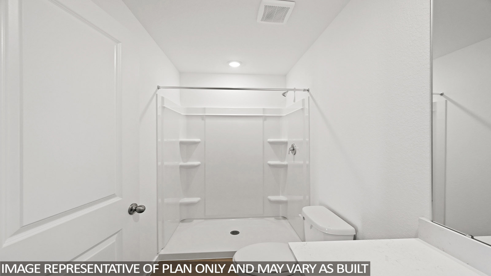 165 Baby Calf Roping Road Jarrell, TX 76537 - Photo 13 of 24 A well-appointed, compact bathroom features a complete shower and toilet setup.