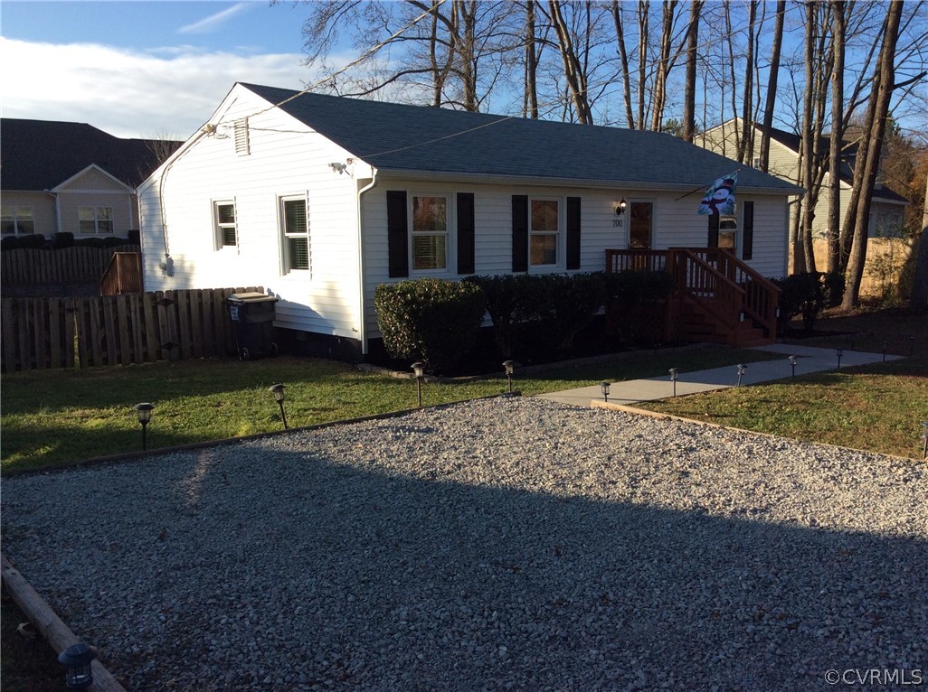 700 Courthouse Road North Chesterfield, VA 23236 - Photo 1 of 47 a view of a white house with a yard and large trees