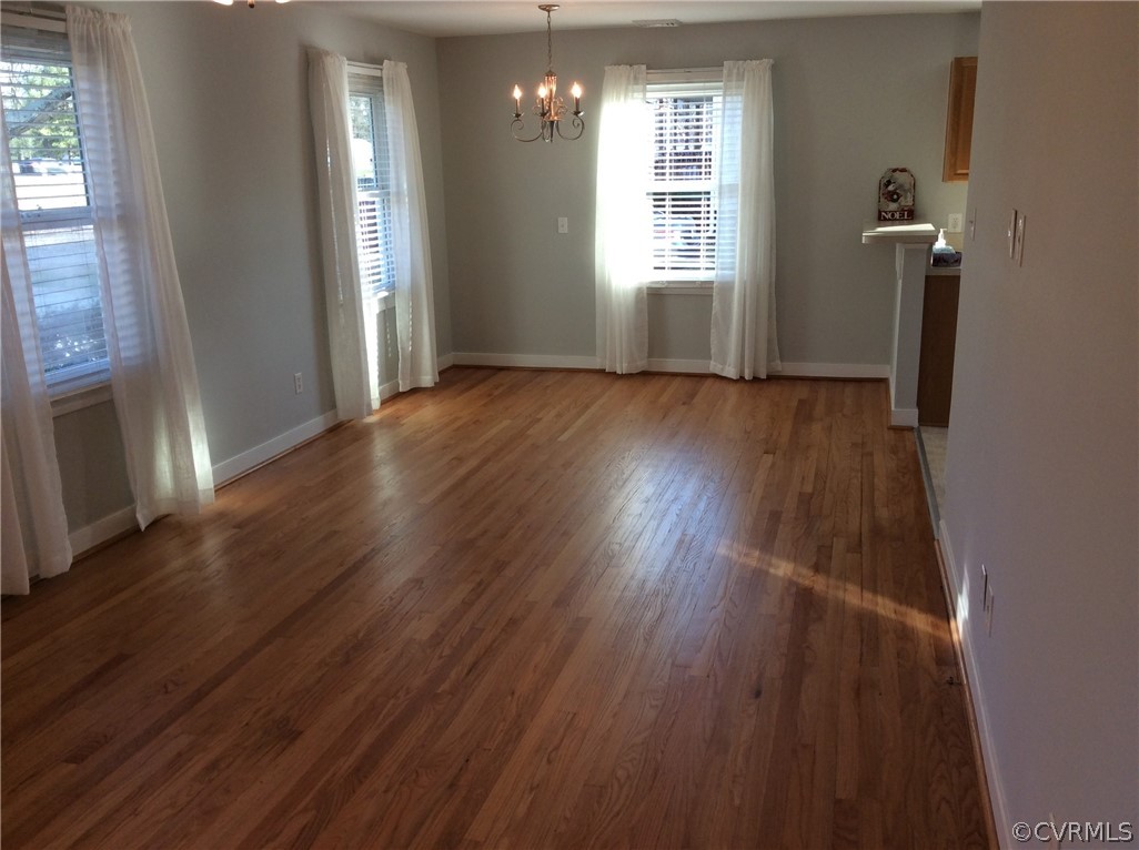 700 Courthouse Road North Chesterfield, VA 23236 - Photo 11 of 47 an empty room with wooden floor and windows