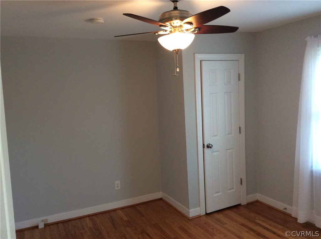 700 Courthouse Road North Chesterfield, VA 23236 - Photo 16 of 47 wooden floor in an empty room with a window