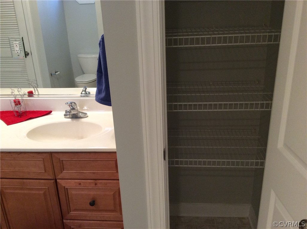 700 Courthouse Road North Chesterfield, VA 23236 - Photo 21 of 47 a bathroom with a sink and a mirror