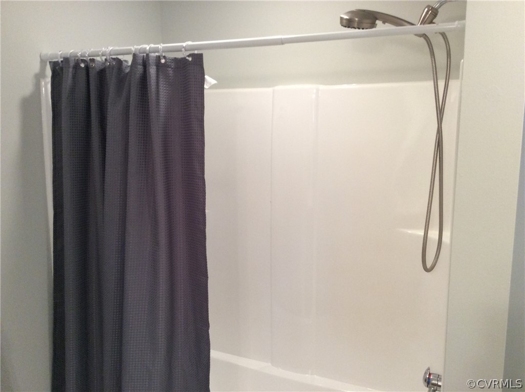 700 Courthouse Road North Chesterfield, VA 23236 - Photo 22 of 47 a bathroom with a shower and a shower curtain