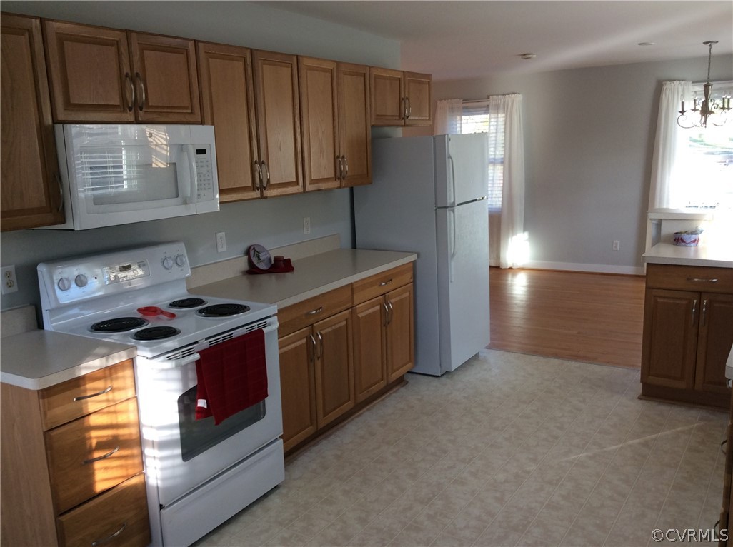 700 Courthouse Road North Chesterfield, VA 23236 - Photo 4 of 47 a kitchen with stainless steel appliances granite countertop a stove a refrigerator and a cabinets