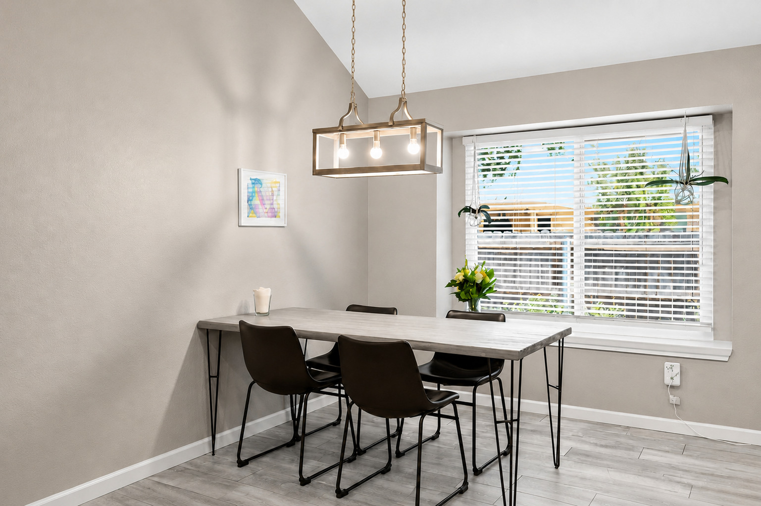1921 Rutherford Drive Leander, TX 78641 - Photo 11 of 29 High vaulted ceilings and a classic bay window enhance this inviting dining space. Virtually Staged.