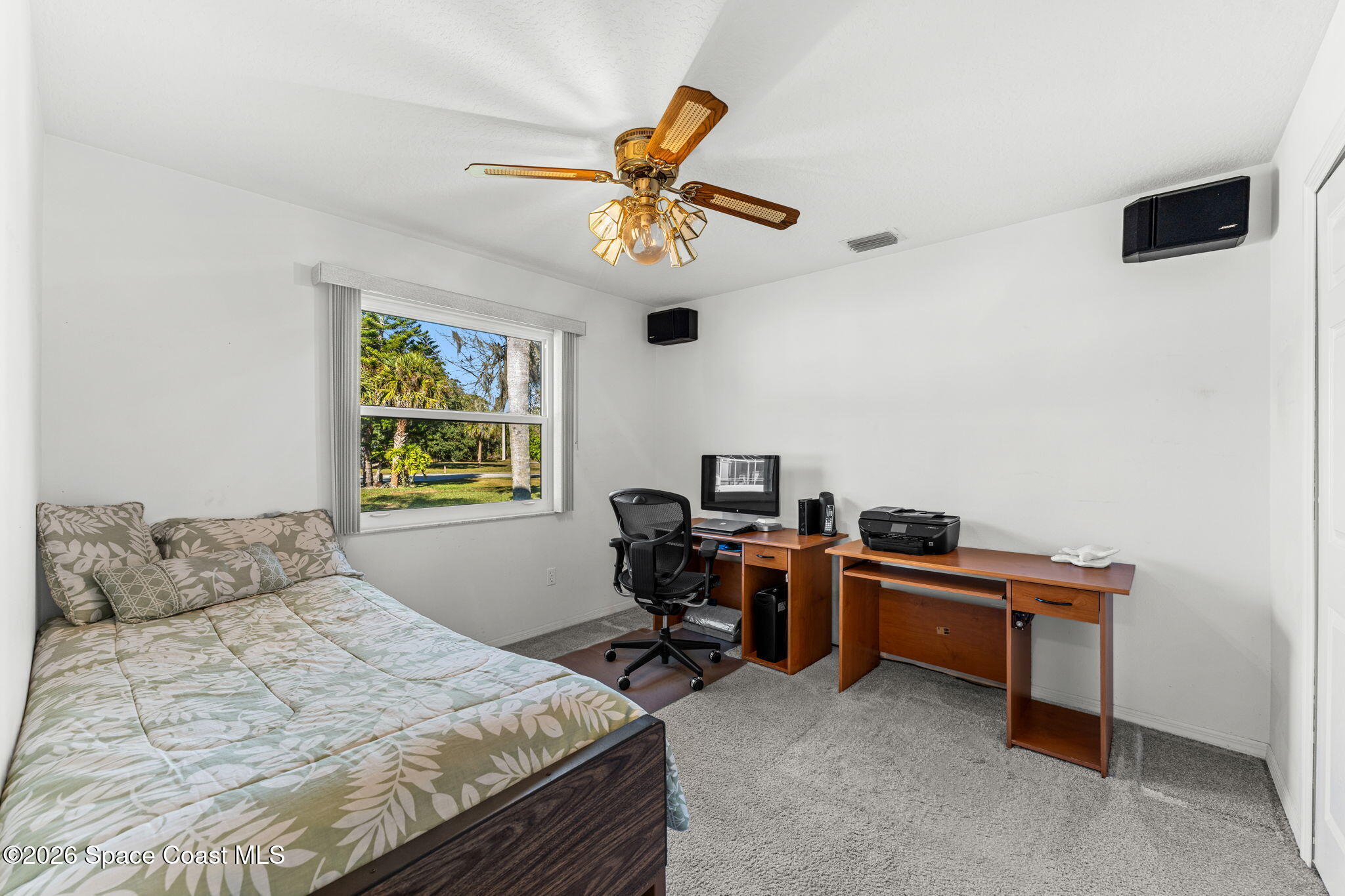 4250 Pine Street Cocoa, FL 32926 - Photo 18 of 30 a bedroom with a workspace