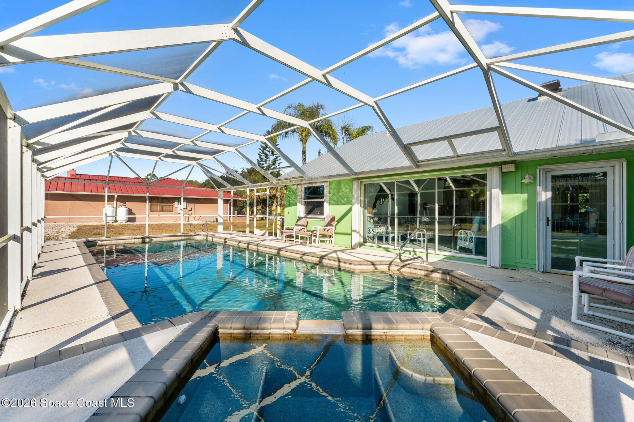 4250 Pine Street Cocoa, FL 32926 - Photo 20 of 30 a house view with a sitting space and balcony
