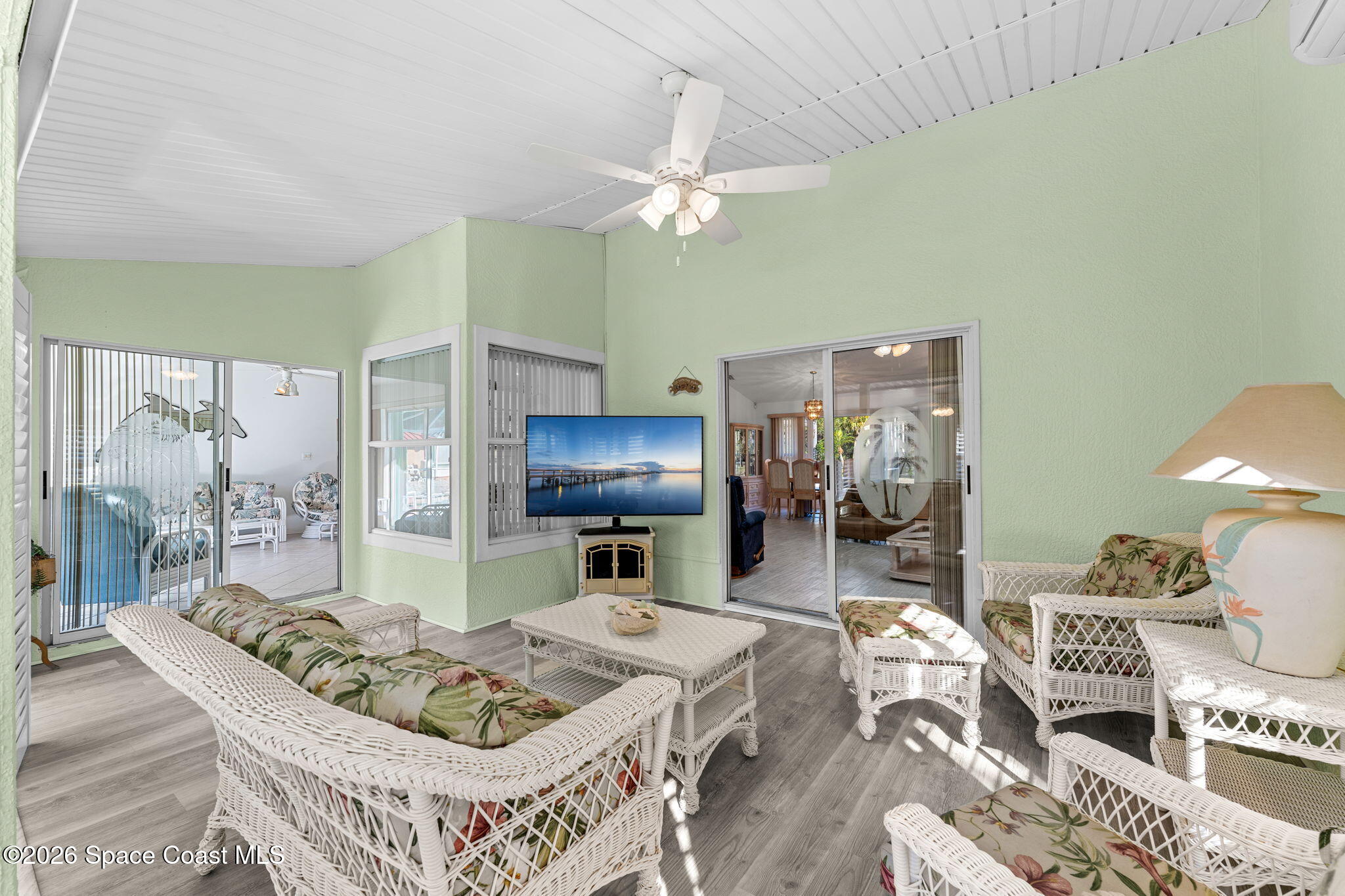 4250 Pine Street Cocoa, FL 32926 - Photo 6 of 30 a living room with furniture and a flat screen tv