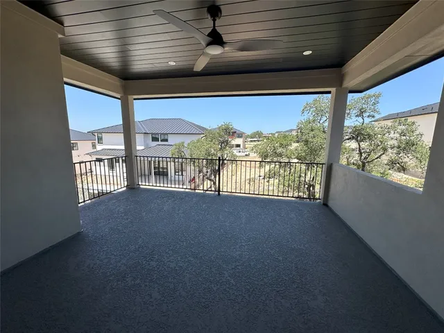 a view of a swimming pool with an outdoor seating