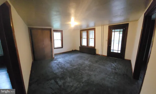 a view of hallway with windows