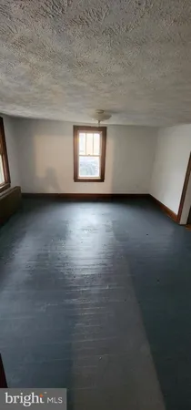 a view of a room with an empty space
