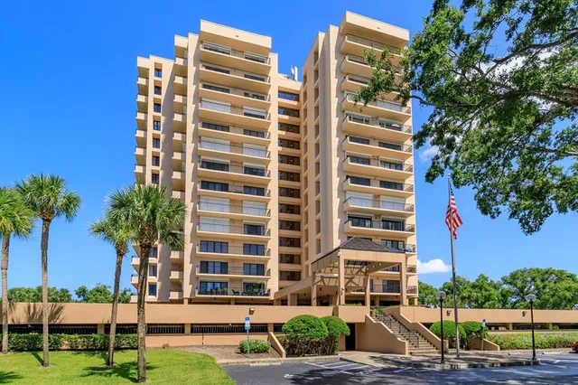 front view of building with a yard