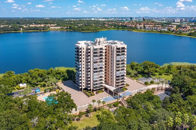 a front view of a building with tree s