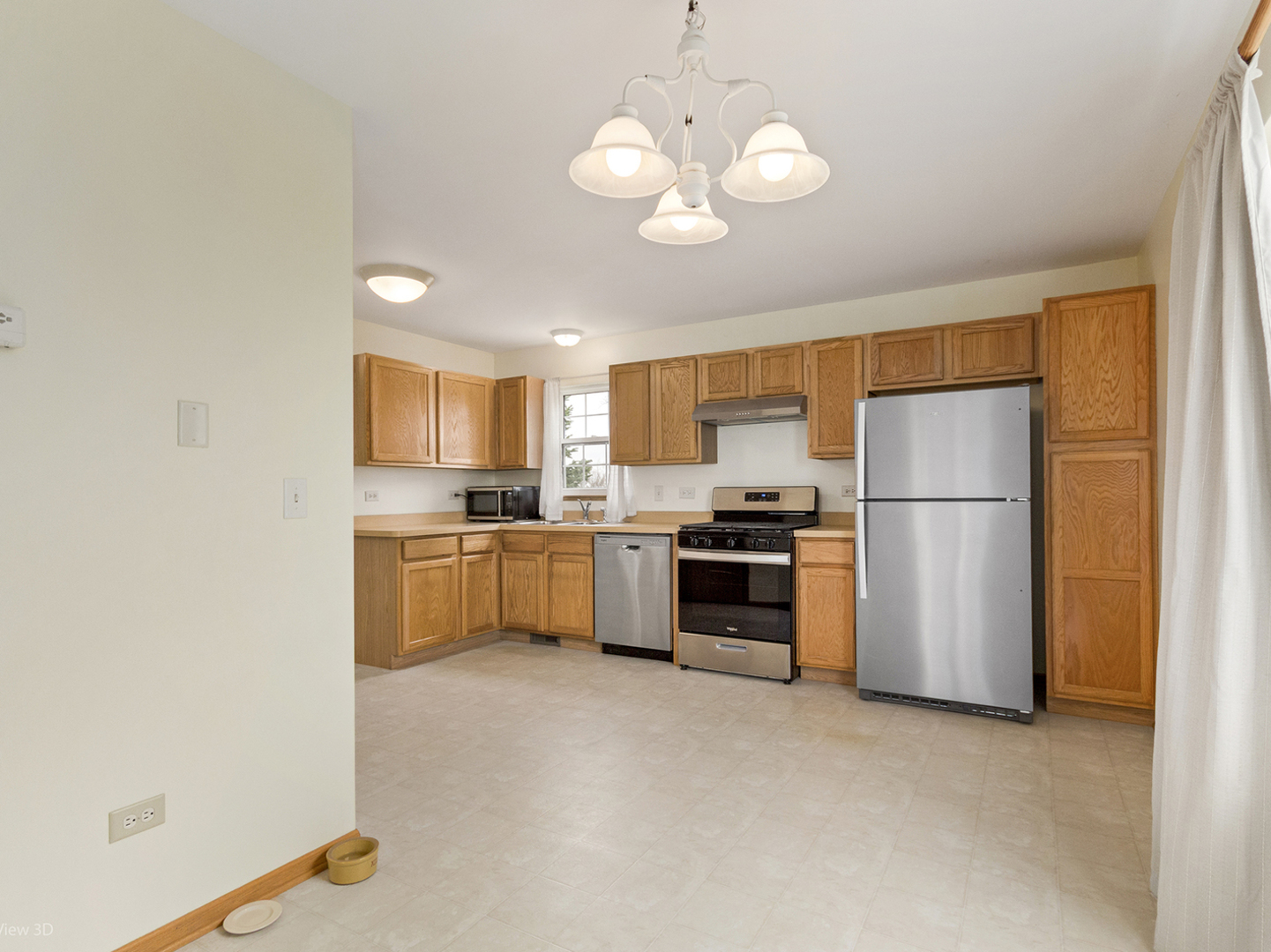 4709 West Iris Lane Monee, IL 60449 - Photo 11 of 28 a kitchen with stainless steel appliances a refrigerator sink and stove