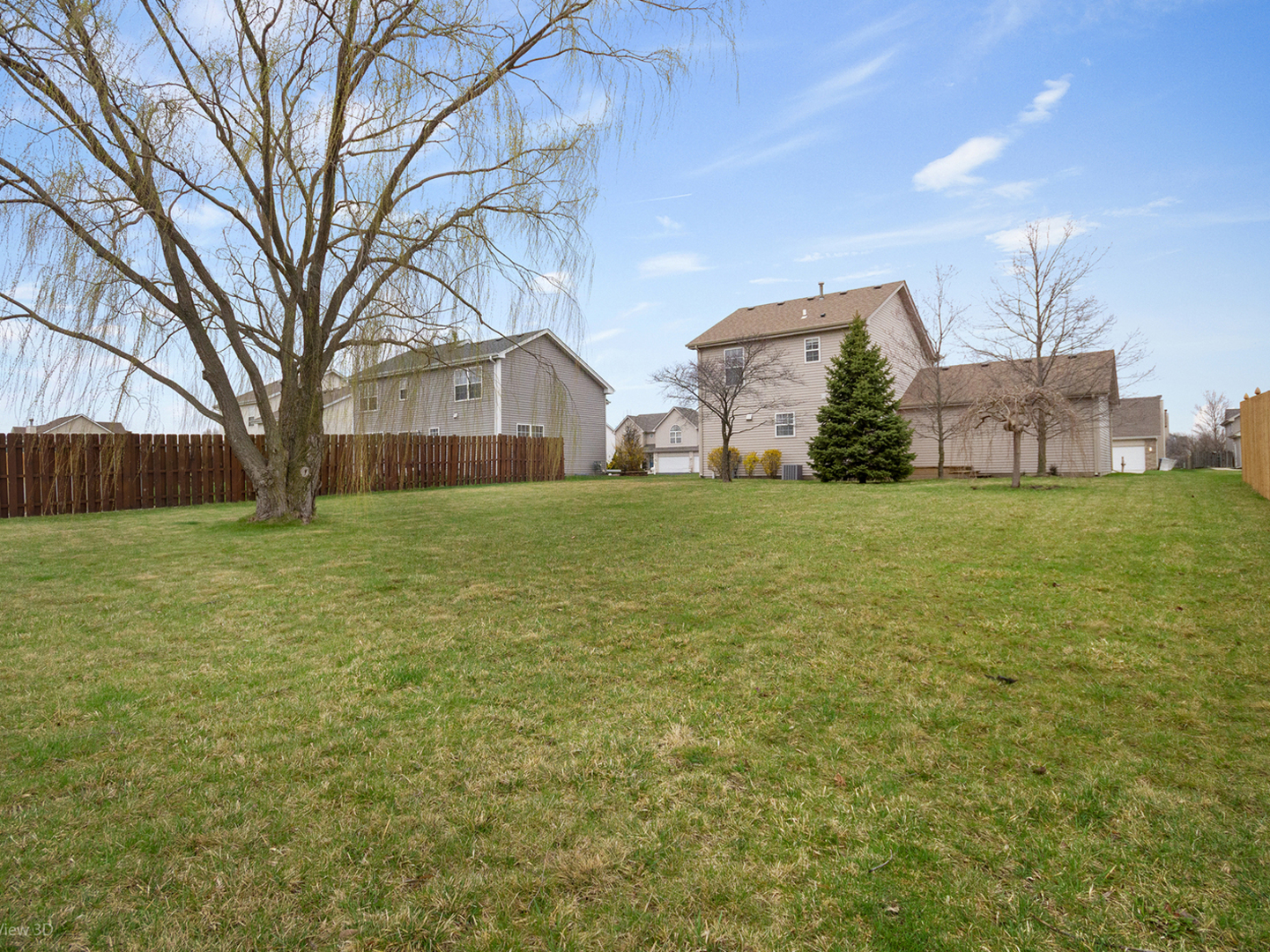 4709 West Iris Lane Monee, IL 60449 - Photo 3 of 28 a view of a house with a yard