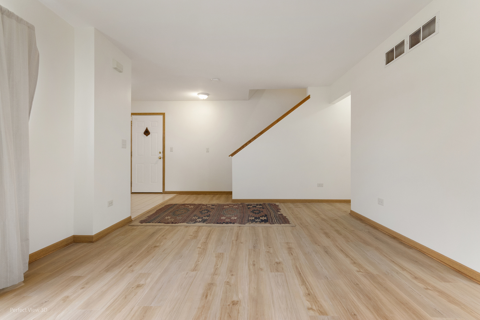 4709 West Iris Lane Monee, IL 60449 - Photo 6 of 28 a view of empty room with wooden floor