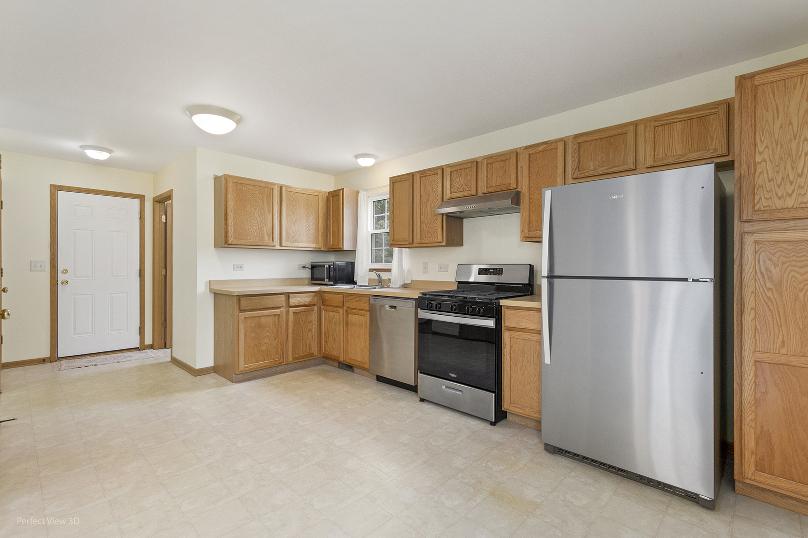 4709 West Iris Lane Monee, IL 60449 - Photo 7 of 28 a kitchen with refrigerator a stove a sink and a refrigerator