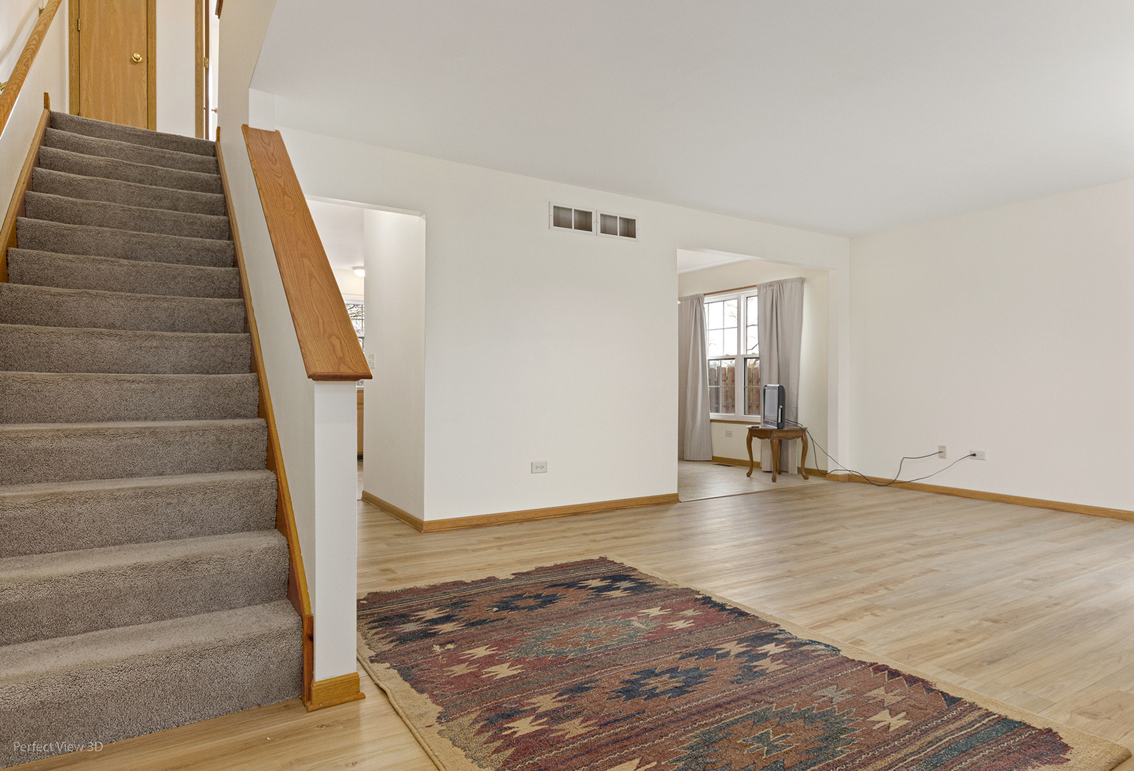 4709 West Iris Lane Monee, IL 60449 - Photo 9 of 28 a view of an empty room with stairs