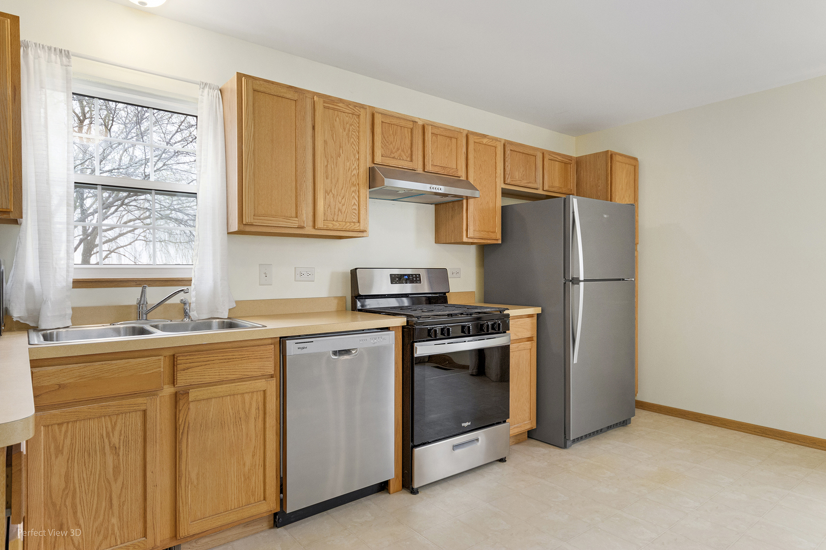 4709 West Iris Lane Monee, IL 60449 - Photo 10 of 28 a kitchen with stainless steel appliances granite countertop a refrigerator and a sink