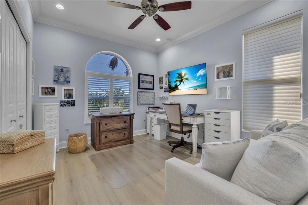 2172 Deborah Drive Punta Gorda, FL 33950 - Photo 24 of 61 a living room with furniture and a flat screen tv